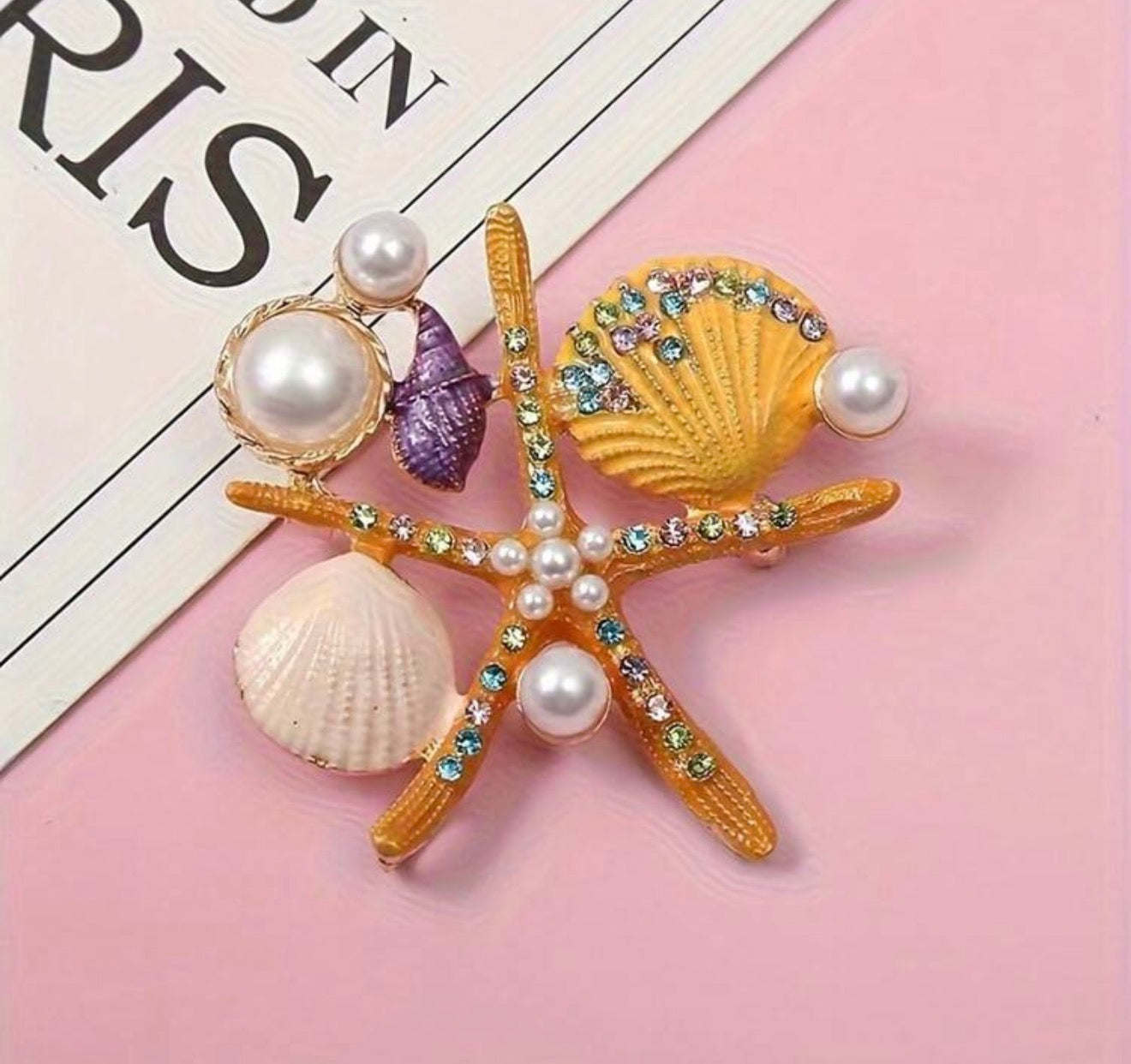 Zinc brooch