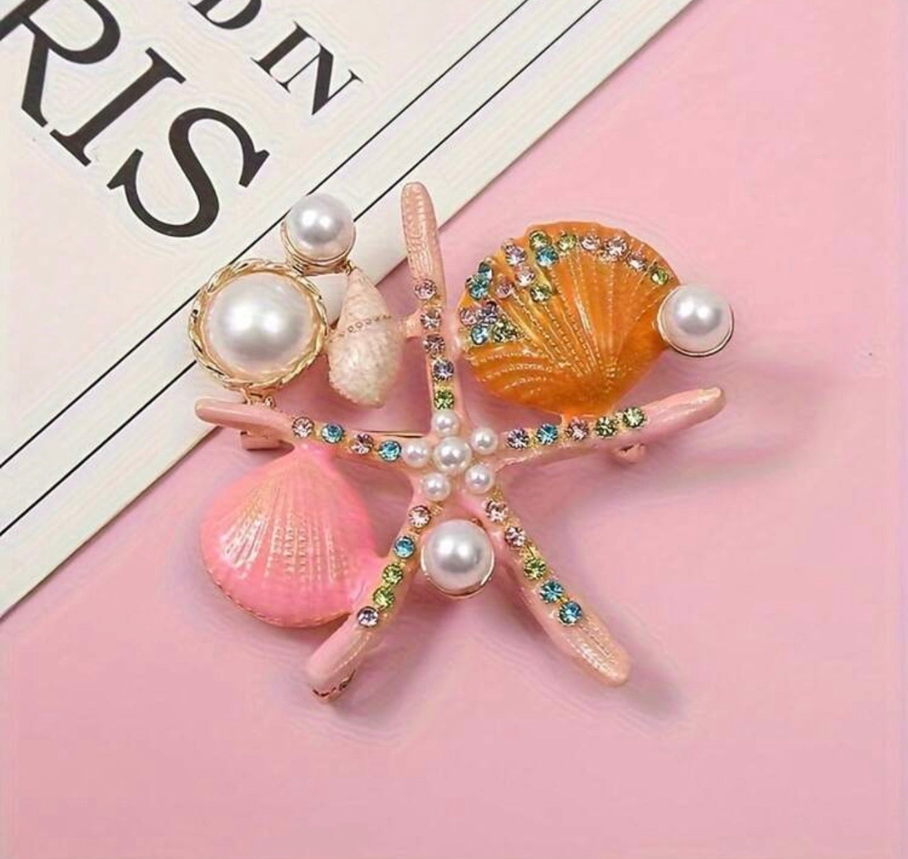 Zinc brooch
